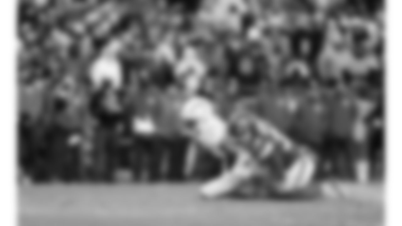 Kansas City Chiefs defensive back Kevin Knowles (38) tackles Los Angeles Chargers wide receiver Tre' Harris (9) during a week 15 NFL football game, Sunday, December 14, 2025 in Kansas City, MO.