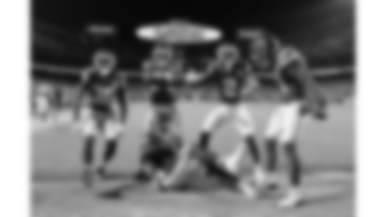 Kansas City Chiefs cornerbacks Jaylen Watson (35), Trent McDuffie (22), Joshua Williams (2) and defensive back Jaden Hicks (21) celebrate an interception by defensive end Mike Danna (51) during a week 8 NFL Football game against the Washington Commanders on Monday, October 27, 2025 in Kansas City, MO.