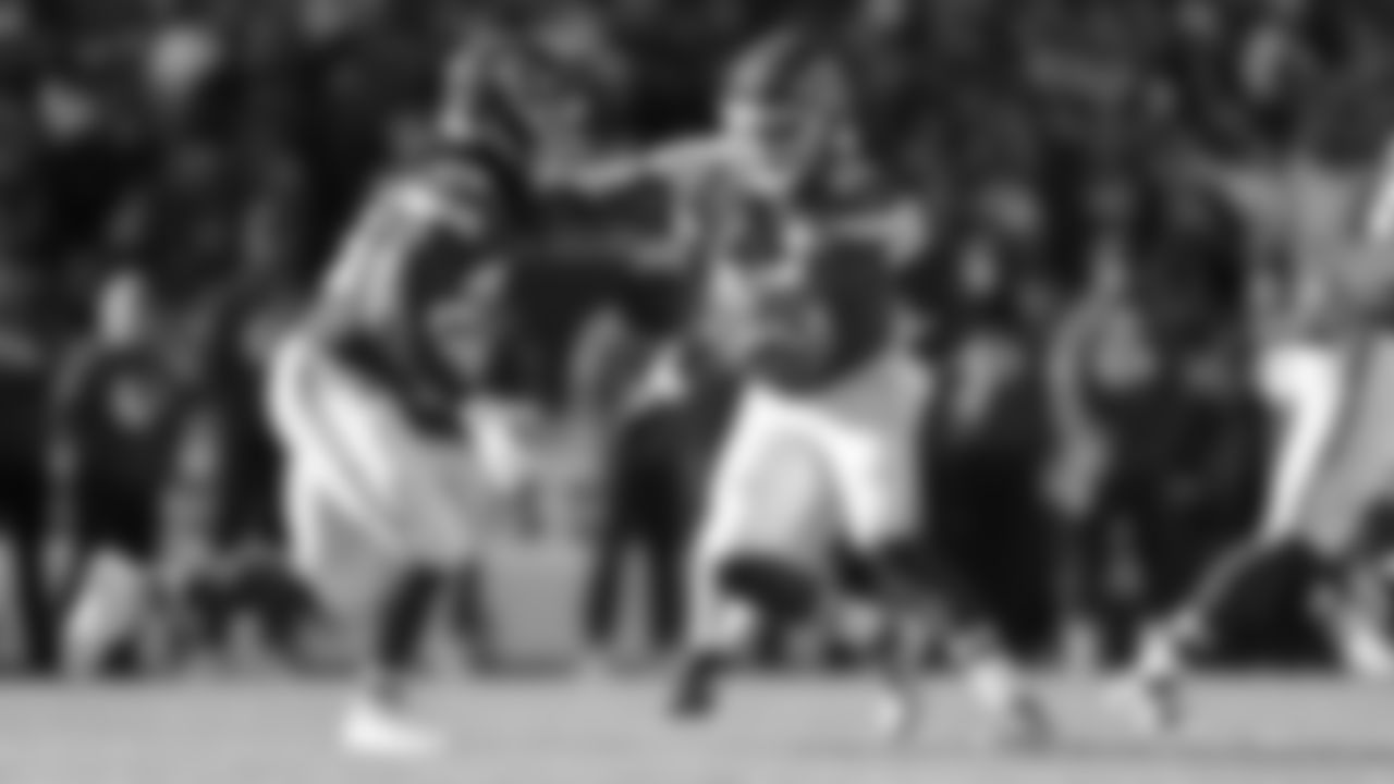 Quarterback Patrick Mahomes (15) hands off the ball to Kansas City Chiefs running back Kareem Hunt (29) during a week 12 NFL Football game against the Indianapolis Colts on Sunday, November 23, 2025 in Kansas City, MO