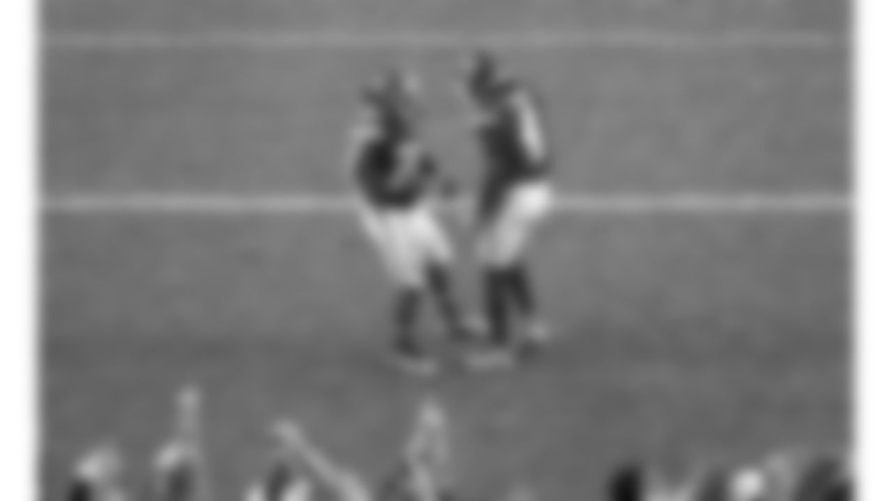 Kansas City Chiefs running back Clyde Edwards-Helaire (26) and wide receiver Rashee Rice (4) celebrate in the end zone during a week 12 NFL football game against the Indianapolis Colts, Sunday, November 23, 2025 in Kansas City, MO.