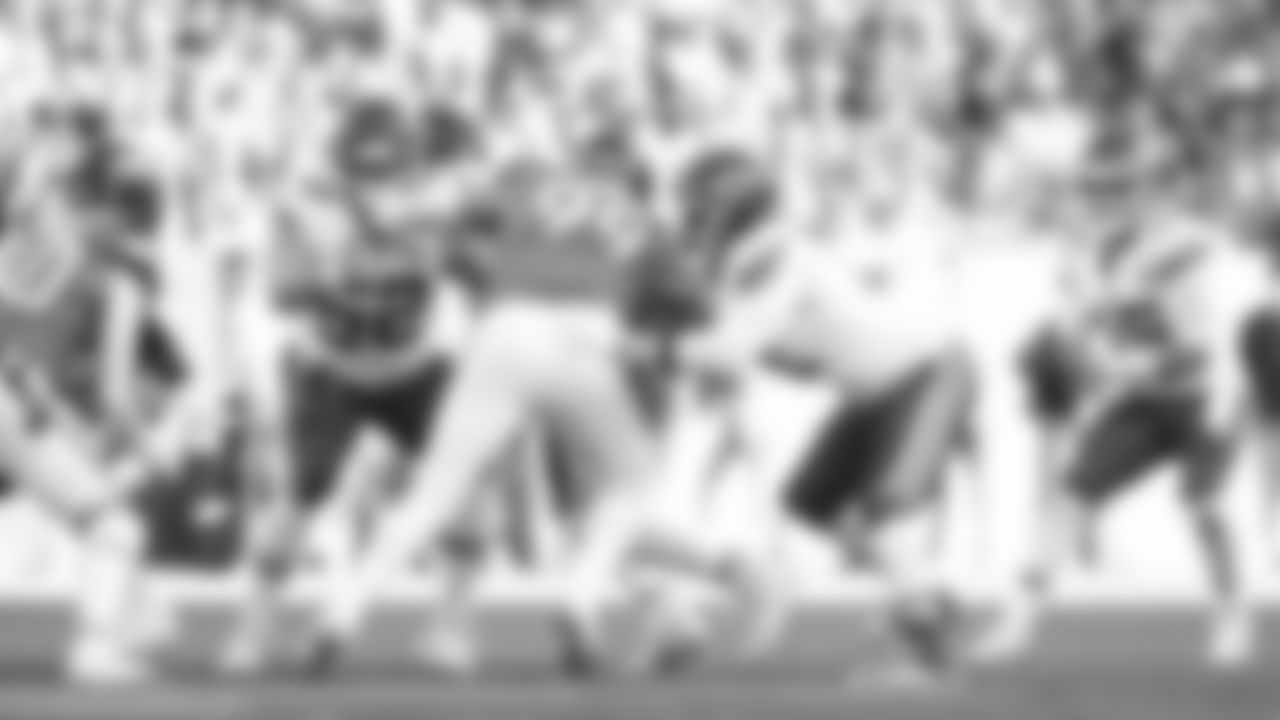 Kansas City Chiefs center Creed Humphrey (52) and tackle Josh Simmons (71) block a Broncos defender during a week 11 NFL Football game against the Denver Broncos on Sunday, November 16, 2025 in Denver, Colorado.