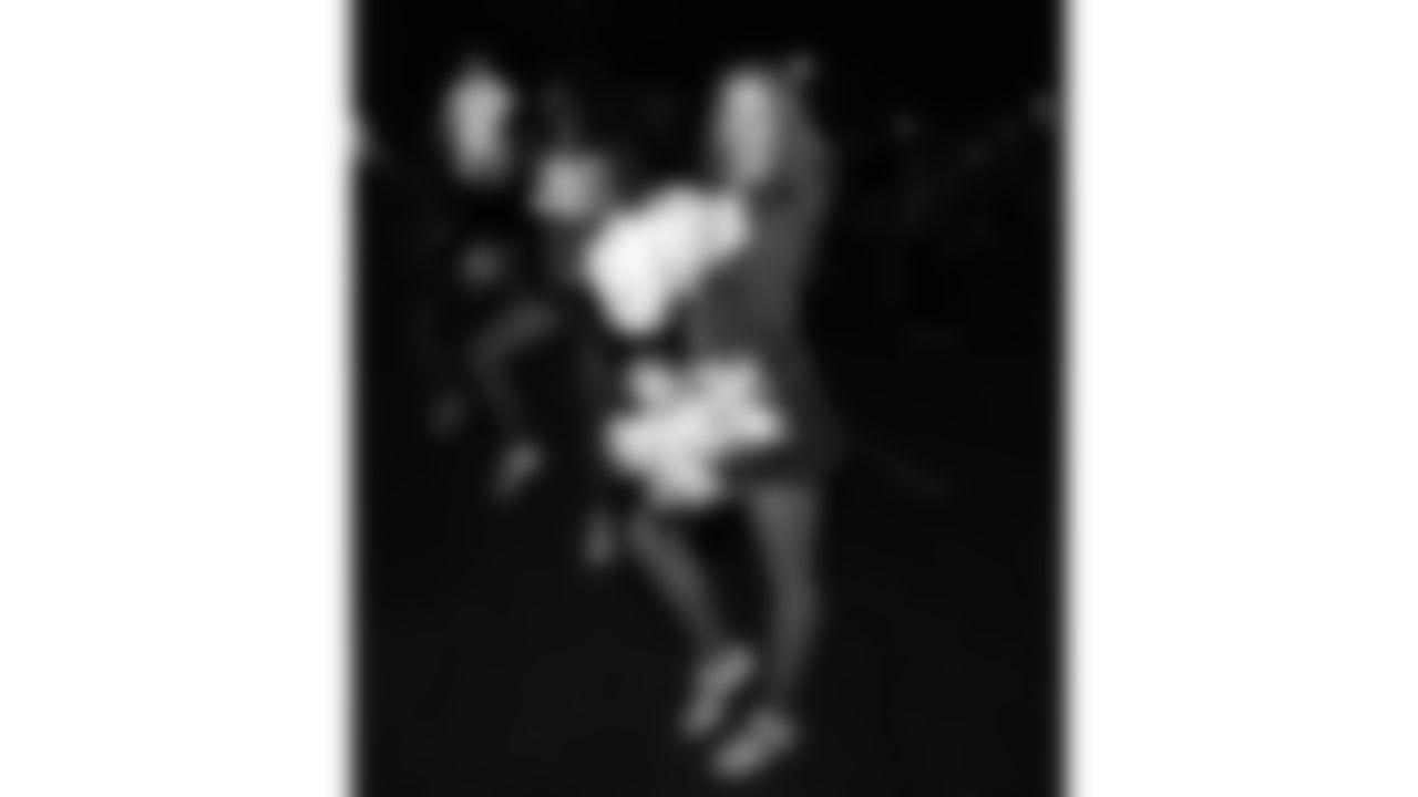 The Kansas City Chiefs Cheerleaders and Entertainment teams prior to a week 17 NFL Football game against the Denver Broncos on December 25, 2025 in Kansas City, MO.