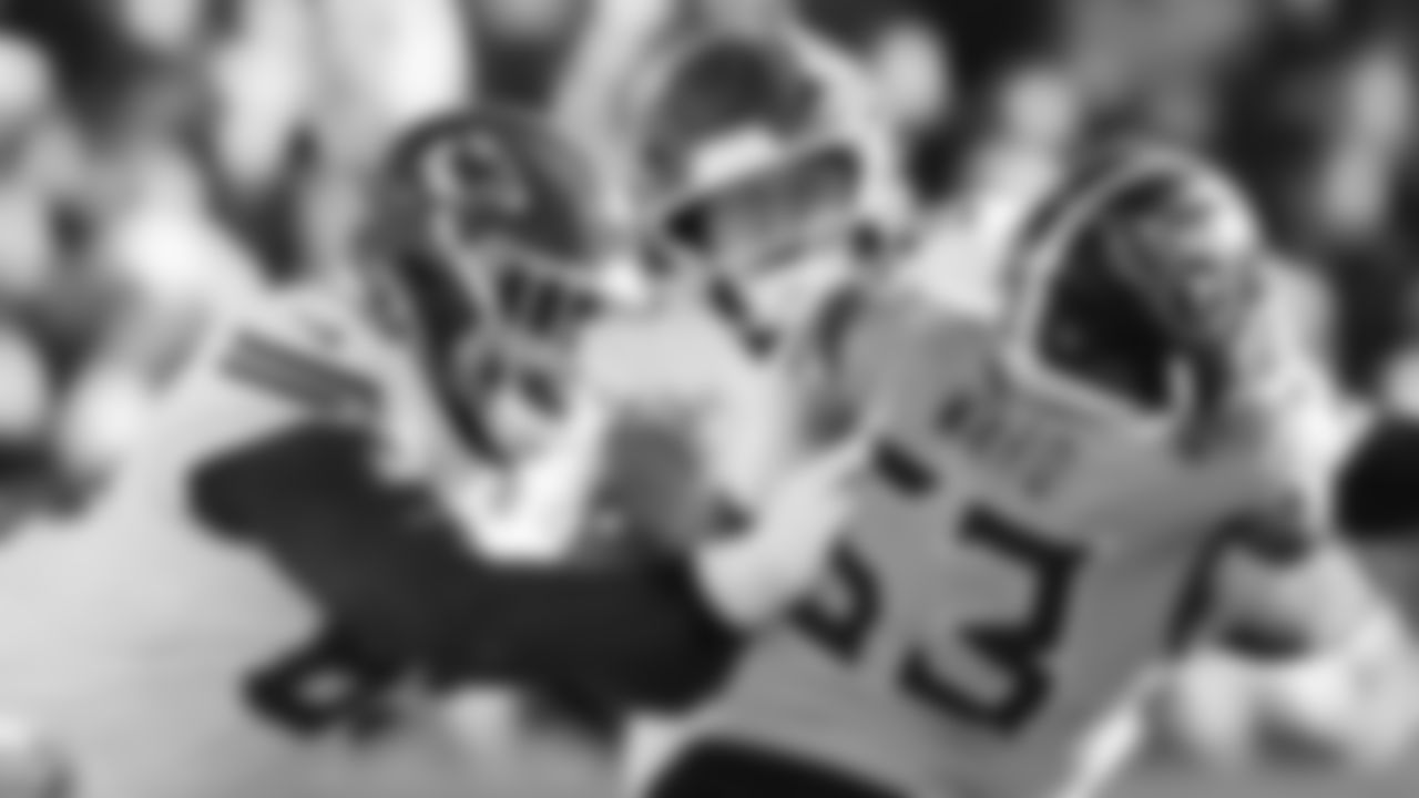 Kansas City Chiefs offensive lineman Trey Smith (65) and center Creed Humphrey (52) make a block during a week 16 NFL Football game against the Tennessee Titans on Sunday, December 21, 2025 in Nashville, Tennessee.