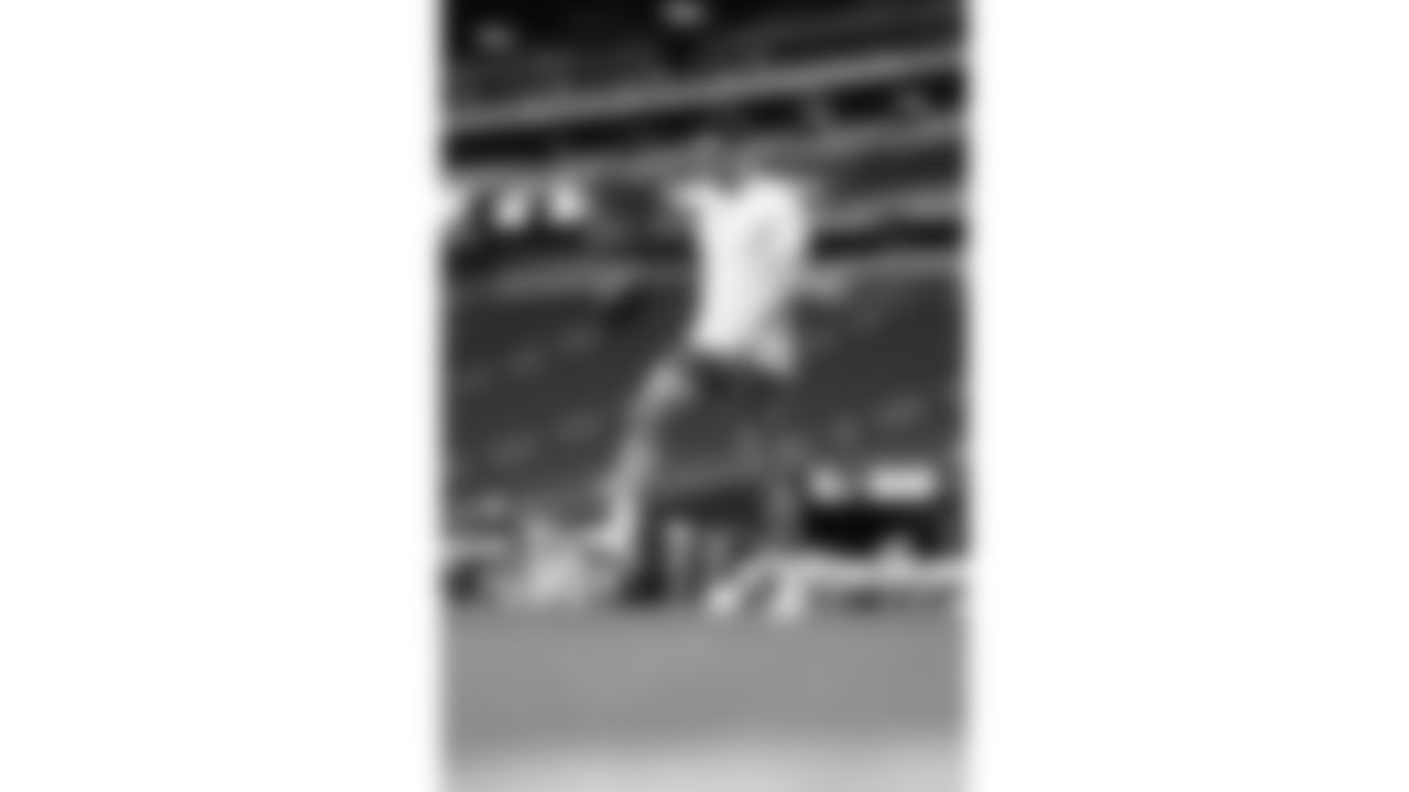 Kansas City Chiefs punter Matt Araiza (14) dribbles a football on the field prior to a week 18 game against the Las Vegas Raiders on Sunday, January 3, 2026.