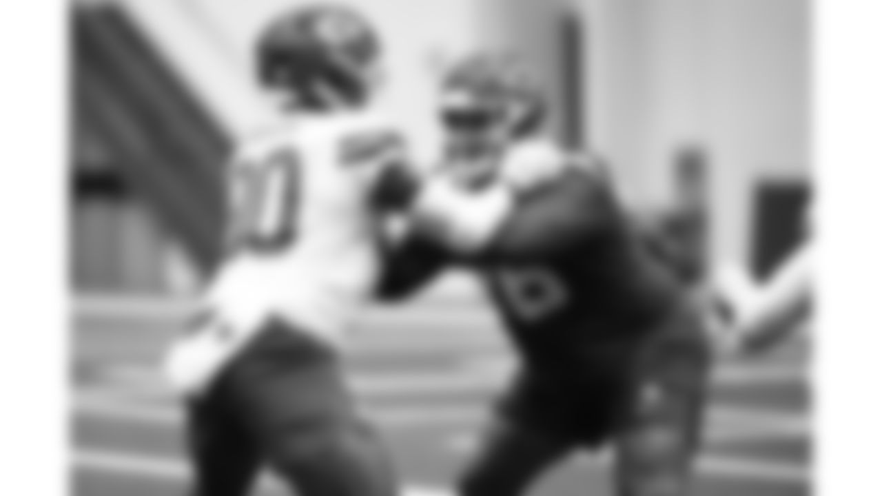 Kansas City Chiefs tackle Kingsley Suamataia (76) and defensive end Charles Omenihu (90) during practice on Thursday, September 18, 2025 in Kansas City, MO.
