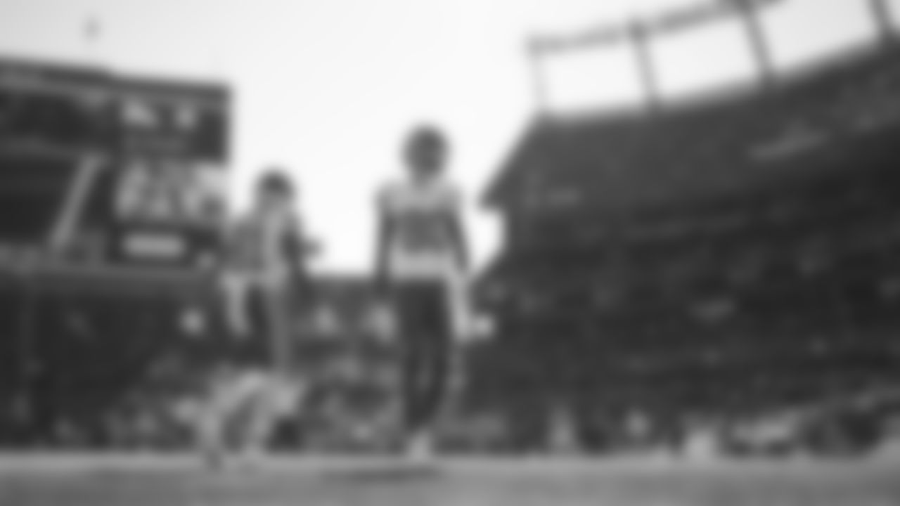 Kansas City Chiefs wide receivers Nikko Remigio (81) and Tyquan Thornton (80) warm up prior to a week 11 NFL Football game against the Denver Broncos on Sunday, November 16, 2025 in Denver, Colorado.