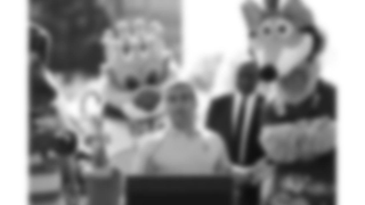 A member of the Kansas City Royals staff speaks at the Bradens Hope Hero Parade and Fountain Dyeing event on Friday, August 29, 2025 at Mill Creek Park in Kansas City, MO.