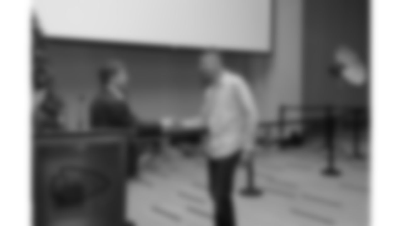 Dan Meers shakes hands with Kansas City Chiefs Chairman, CEO, and Owner Clark Hunt. The Kansas City Chiefs hosted a holiday party for Chiefs staff, family, and players at Arrowhead Stadium on December 16, 2016.