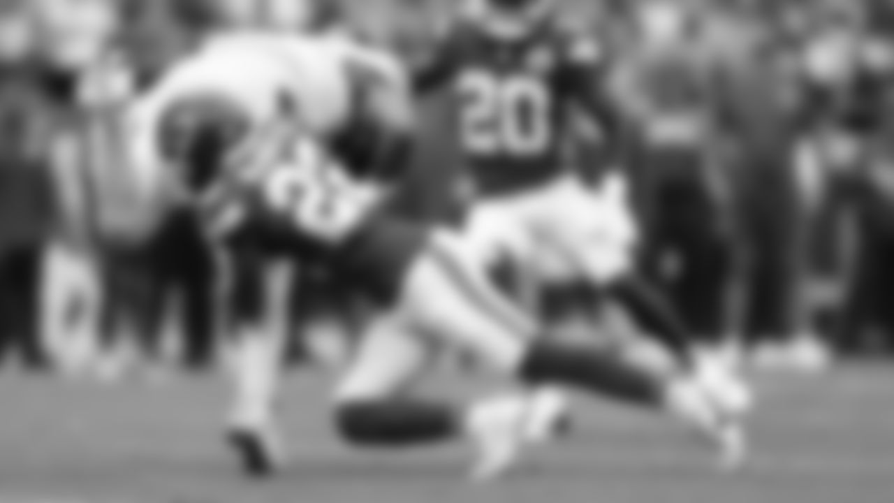 Kansas City Chiefs cornerback Trent McDuffie (22) tackles Philadelphia Eagles quarterback Jalen Hurts (1) during the week 2 NFL football game, Sunday, September 14, 2025 in Kansas City, MO.