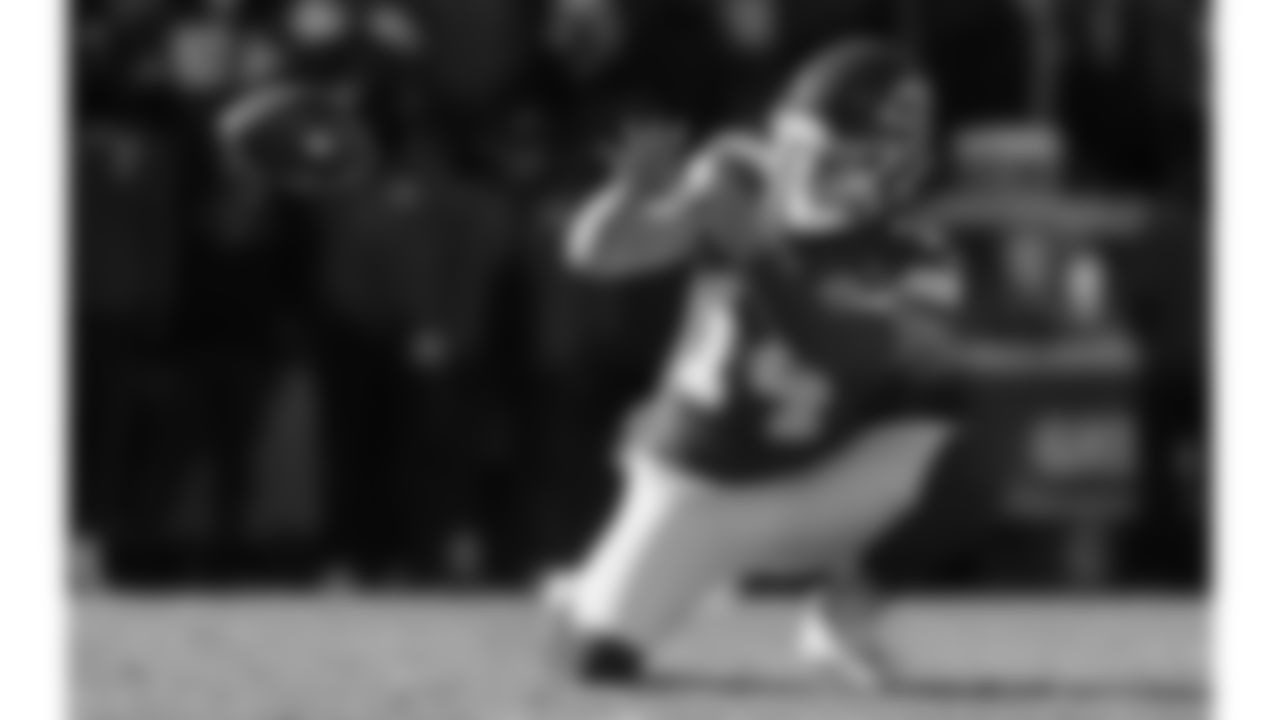 Kansas City Chiefs punter Matt Araiza (14) catches a snap to hold during a week 15 NFL football game against the Los Angeles Chargers, Sunday, December 14, 2025 in Kansas City, MO.