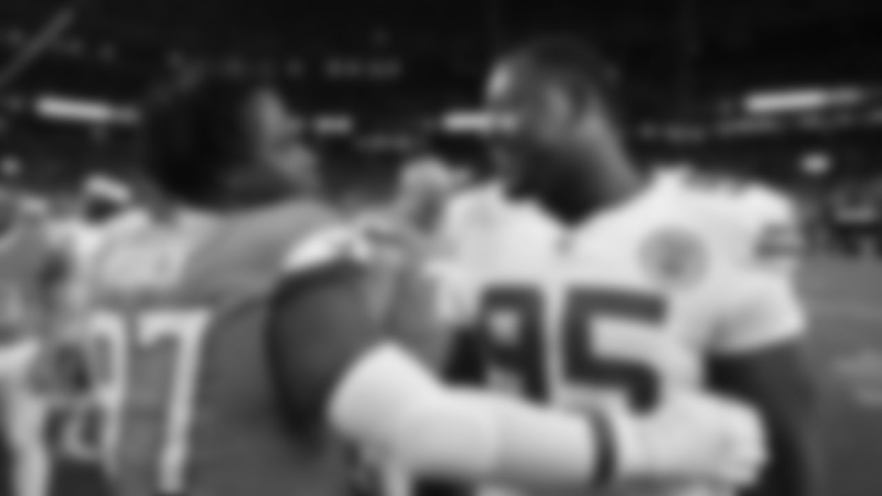 Kansas City Chiefs defensive tackle Chris Jones (95) and Broncos defensive tackle Malcolm Roach (97) after a week 11 NFL Football game against the Denver Broncos on Sunday, November 16, 2025 in Denver, Colorado.