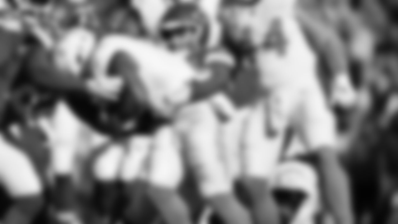 Defensive back Chamarri Conner (27) and Kansas City Chiefs middle linebacker Drue Tranquill (23) make a tackle during an NFL week 15 matchup against the Los Angeles Chargers, Sunday December 14, 2025.