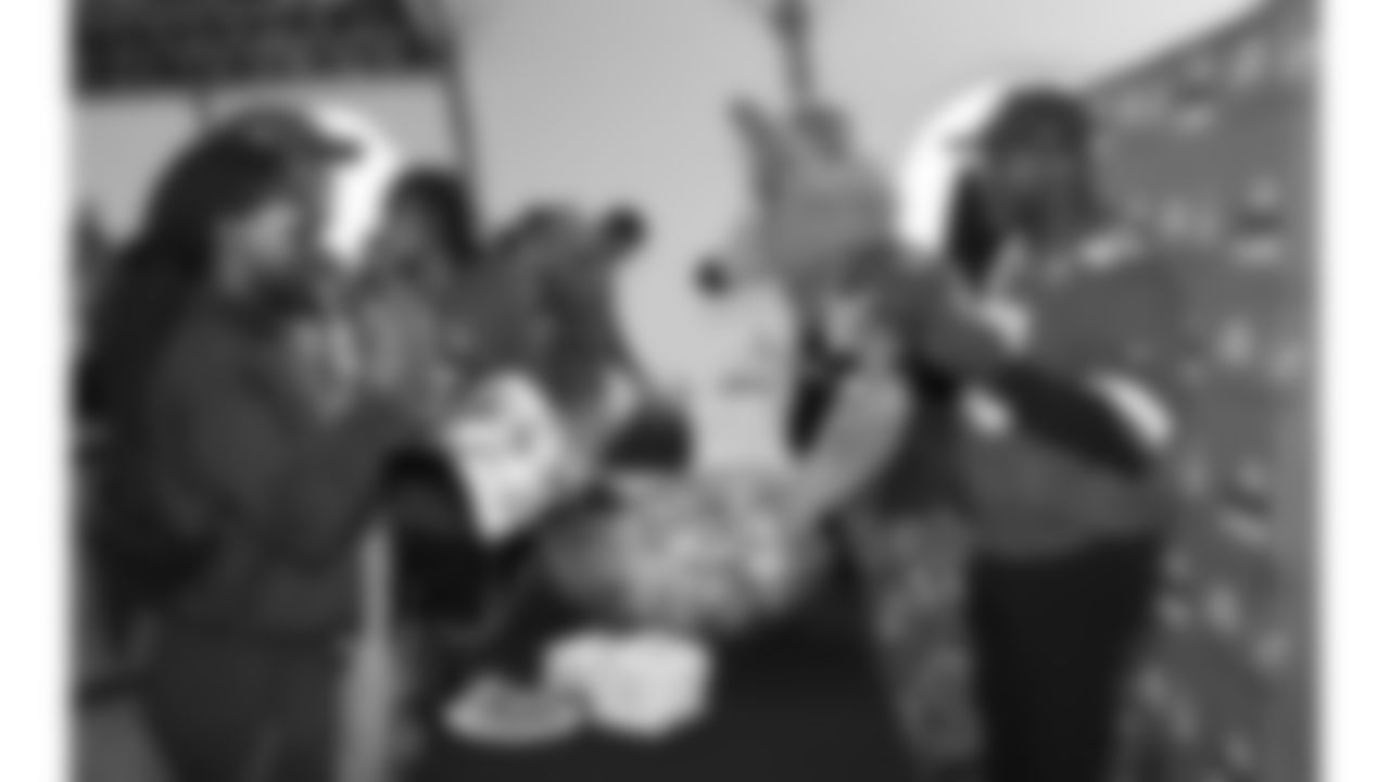 Kansas City Chiefs representatives and the Little Caesars Love Kitchen provide pizza for local U.S. service members and their families at Life.Church Faith & Family Chapel on Tuesday, September 23, 2025 in Kansas City, MO.