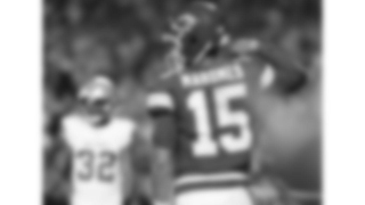 Kansas City Chiefs quarterback Patrick Mahomes (15) flexes in front of Detroit Lions safety Brian Branch (32) during the week 6 NFL football game, Sunday, October 12, 2025 in Kansas City, MO.