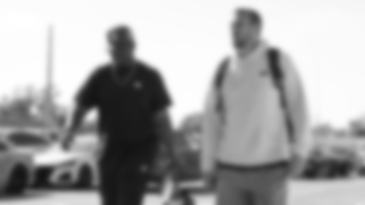 Kansas City Chiefs Offensive Assistant Coach Kevin Saxton and Defensive quality control coach Louie Addazio arrive prior to a preseason week 3 NFL football game against the Chicago Bears, Friday, August 22, 2025.