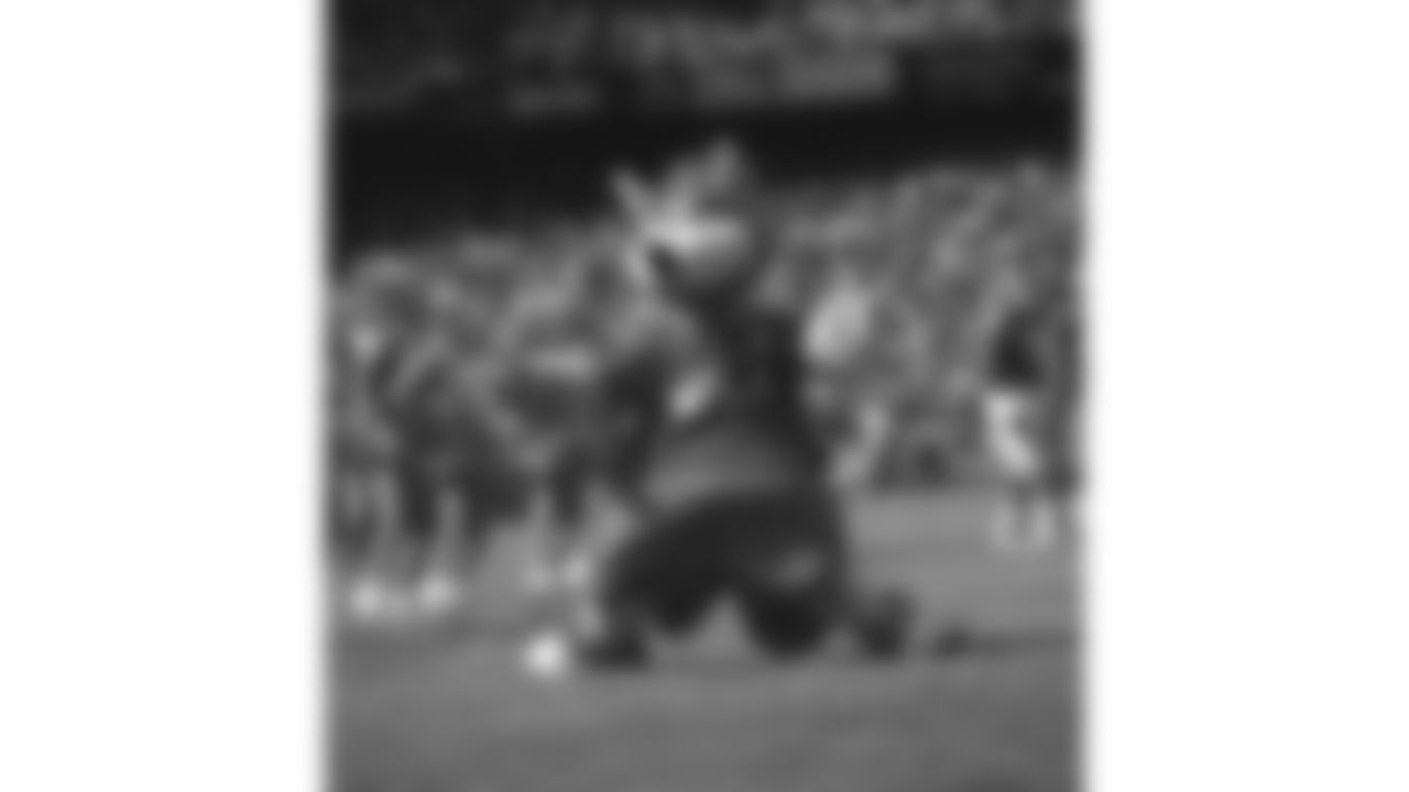KC Wolf dances on the field during a 1998 home game.