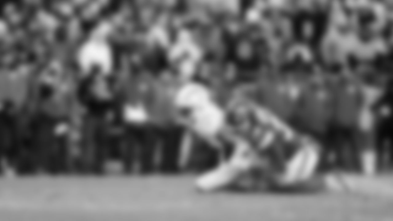 Kansas City Chiefs defensive back Kevin Knowles (38) tackles Los Angeles Chargers wide receiver Tre' Harris (9) during a week 15 NFL football game, Sunday, December 14, 2025 in Kansas City, MO.