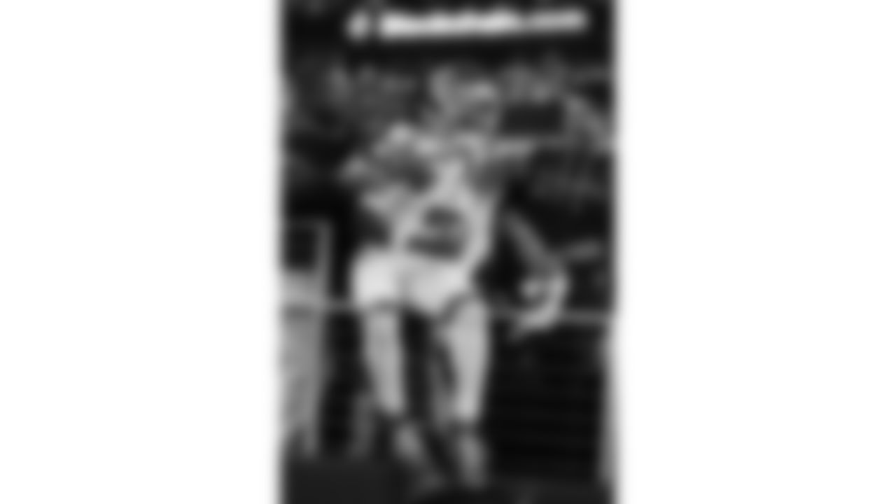 Kansas City Chiefs wide receiver Hollywood Brown (5) jumps into the stands and celebrates a touchdown during a week 13 NFL Football game against the Dallas Cowboys on Thursday, November 27, 2025 in Dallas, Texas.