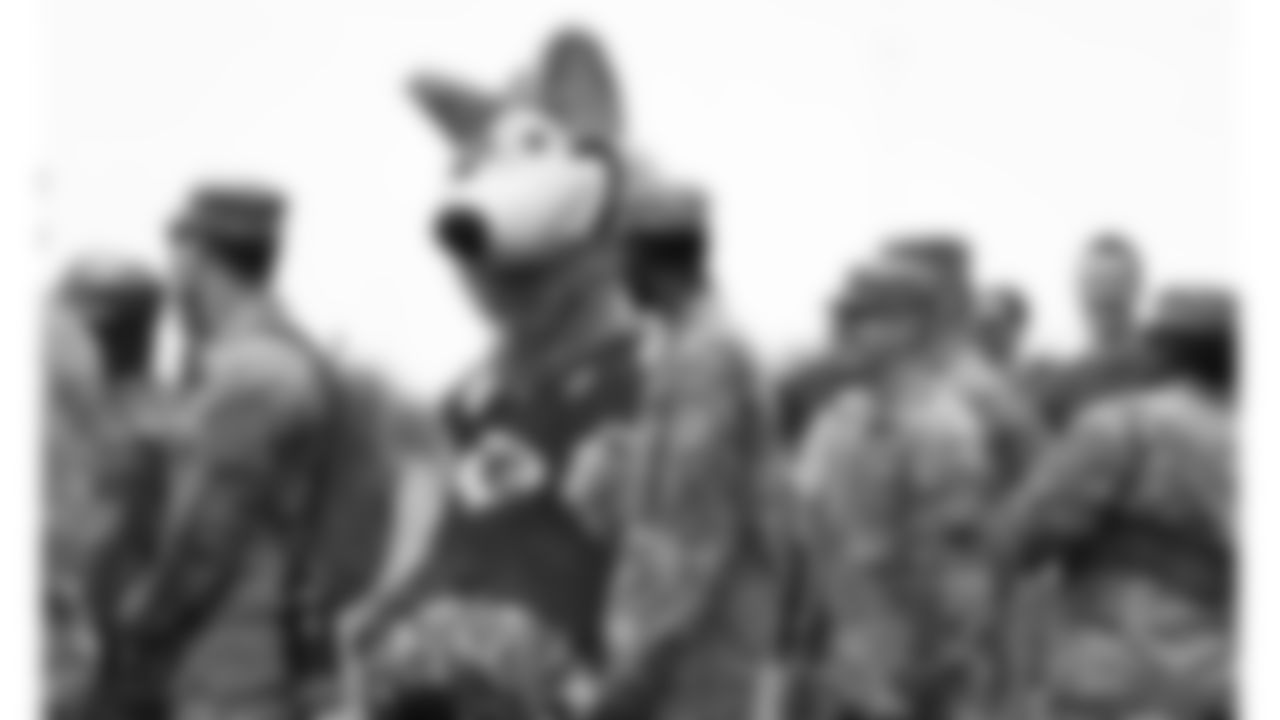 KC Wolf and a service member during day 2 of the Season Ticket Member First Look Event on Wednesday June 18, 2025 in Kansas City, MO.