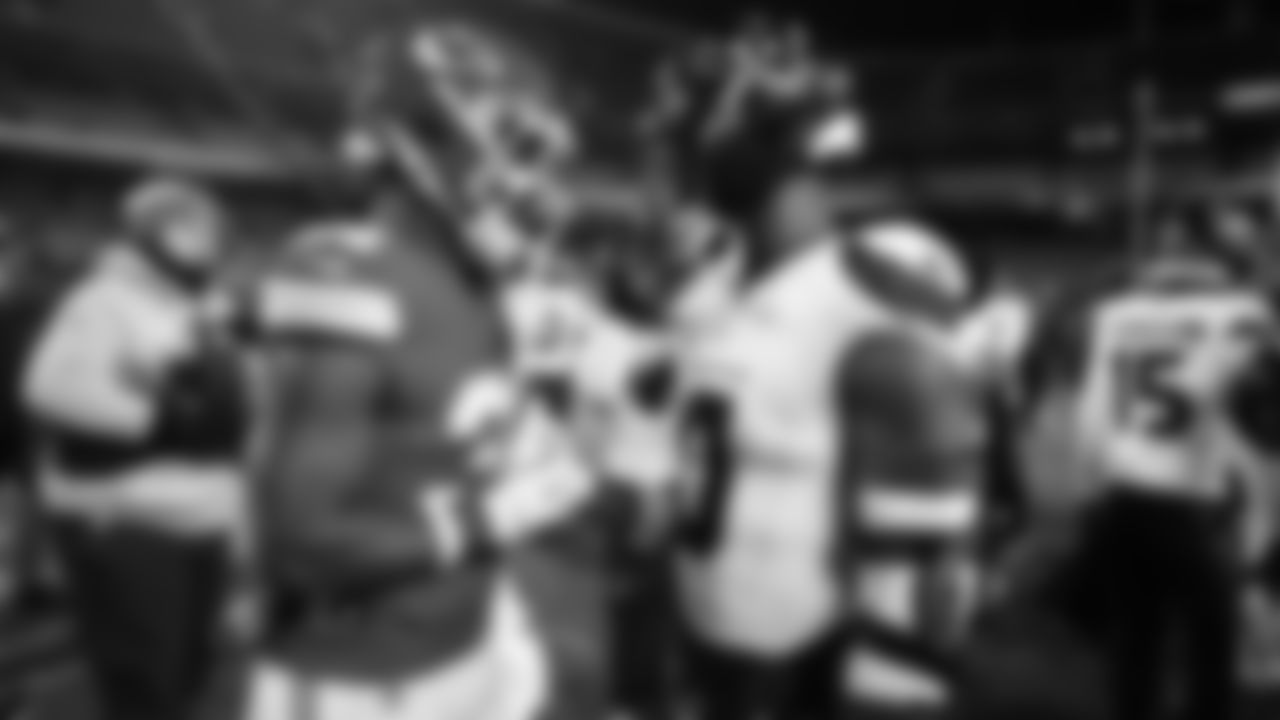 Kansas City Chiefs linebacker Jeffrey Bassa (31) shakes hands with Houston Texans linebacker Azeez Al-Shaair (0) after an NFL week 14 matchup against the Houston Texans, Sunday December 7, 2025.