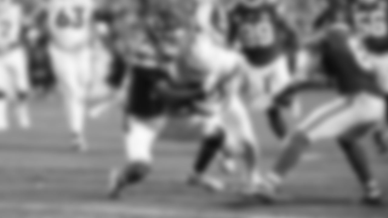 Kansas City Chiefs defensive back Jaden Hicks (21) hits Denver Broncos quarterback Bo Nix (10) during a week 17 NFL football game, Thursday, December 25, 2025 in Kansas City, MO.