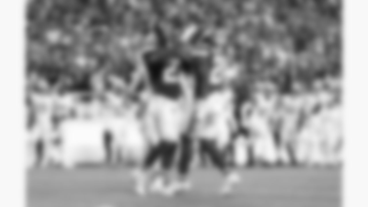 Kansas City Chiefs defensive back Chamarri Conner (27) and defensive back Nohl Williams (20) celebrate during the week 6 NFL football game against the Detroit Lions, Sunday, October 12, 2025 in Kansas City, MO.