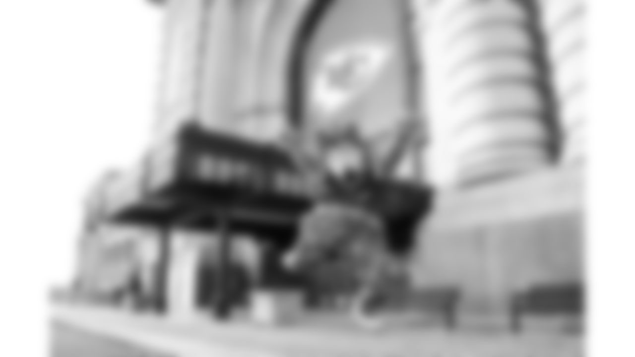 KC Wolf jumps in front of Chiefs signage displayed at Union Station, Kansas City, Missouri, January, 5, 2021.