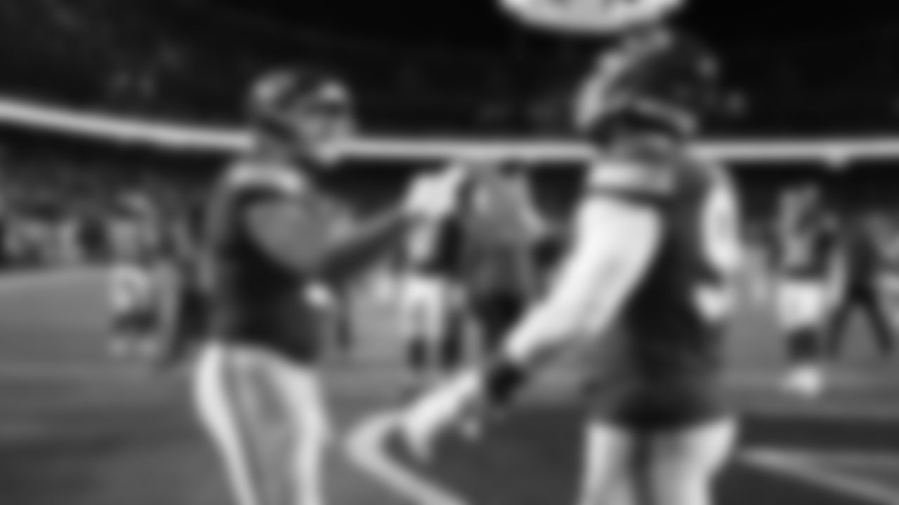 Offensive lineman C.J. Hanson (61) and Kansas City Chiefs defensive tackle Chris Jones (95) warm up prior to an NFL week 14 matchup against the Houston Texans, Sunday December 7, 2025.