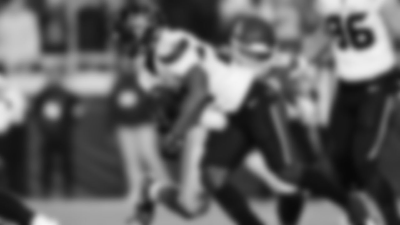 Kansas City Chiefs defensive end George Karlaftis (56) makes a tackle during an NFL week 14 matchup against the Houston Texans, Sunday December 7, 2025.