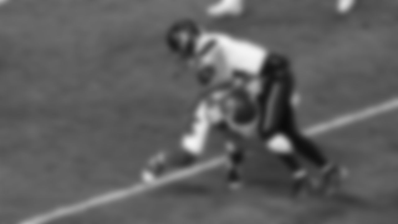 Kansas City Chiefs cornerback Jaylen Watson (35) tackles Houston Texans wide receiver Jaylin Noel (14) during a week 14 NFL football game, Sunday, December 7, 2025 in Kansas City, MO.