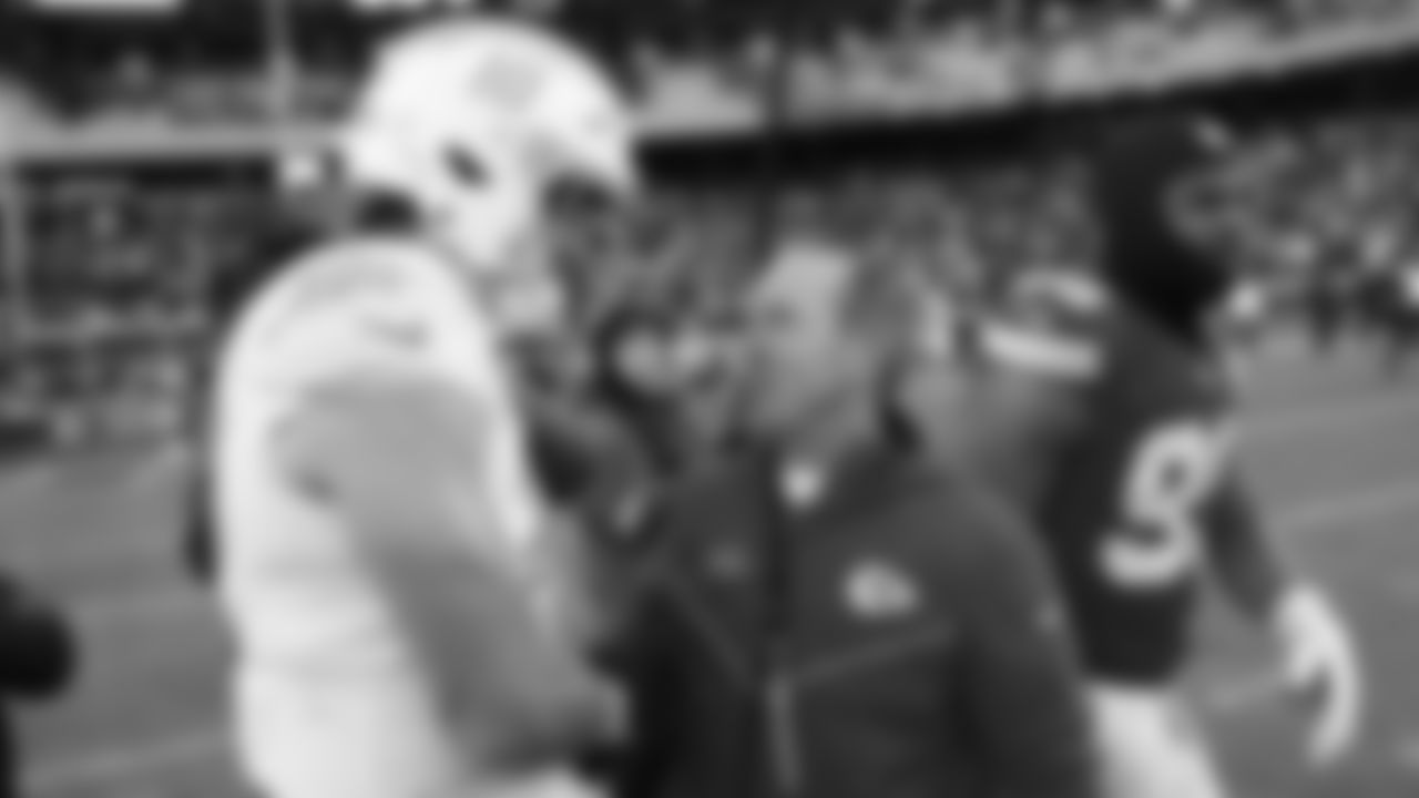 Kansas City Chiefs Defensive Coordinator Steve Spagnuolo shakes hands with San Diego Chargers quarterback Justin Herbert (10) after an NFL week 15 matchup against the Los Angeles Chargers, Sunday December 14, 2025.