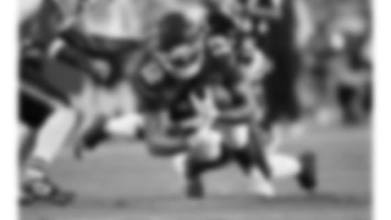 Kansas City Chiefs tight end Jared Wiley (12) gets tackled by Chicago Bears linebacker Ruben Hyppolite II (47) during a preseason week 3 NFL football game, Friday, August 22, 2025 in Kansas City, MO.