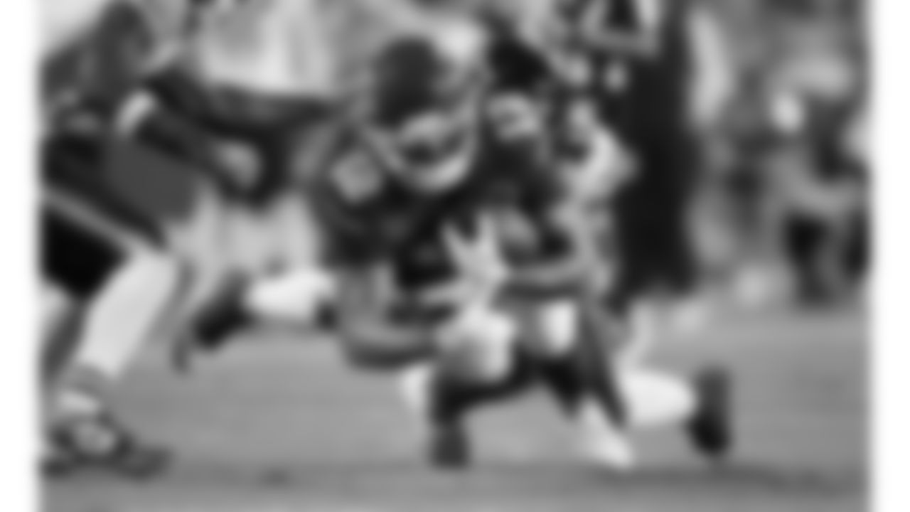 Kansas City Chiefs tight end Jared Wiley (12) gets tackled by Chicago Bears linebacker Ruben Hyppolite II (47) during a preseason week 3 NFL football game, Friday, August 22, 2025 in Kansas City, MO.