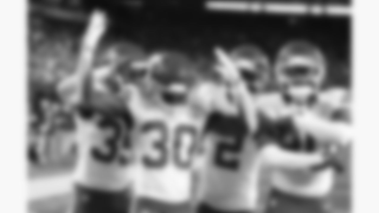 Kansas City Chiefs cornerback Jaylen Watson (35), cornerback Chris Roland-Wallace (30), cornerback Joshua Williams (2) and defensive back Nohl Williams (20) celebrate in the end zone after getting an interception during the week 3 NFL football game against the New York Giants, Sunday, September 21, 2025 in East Rutherford, NJ.