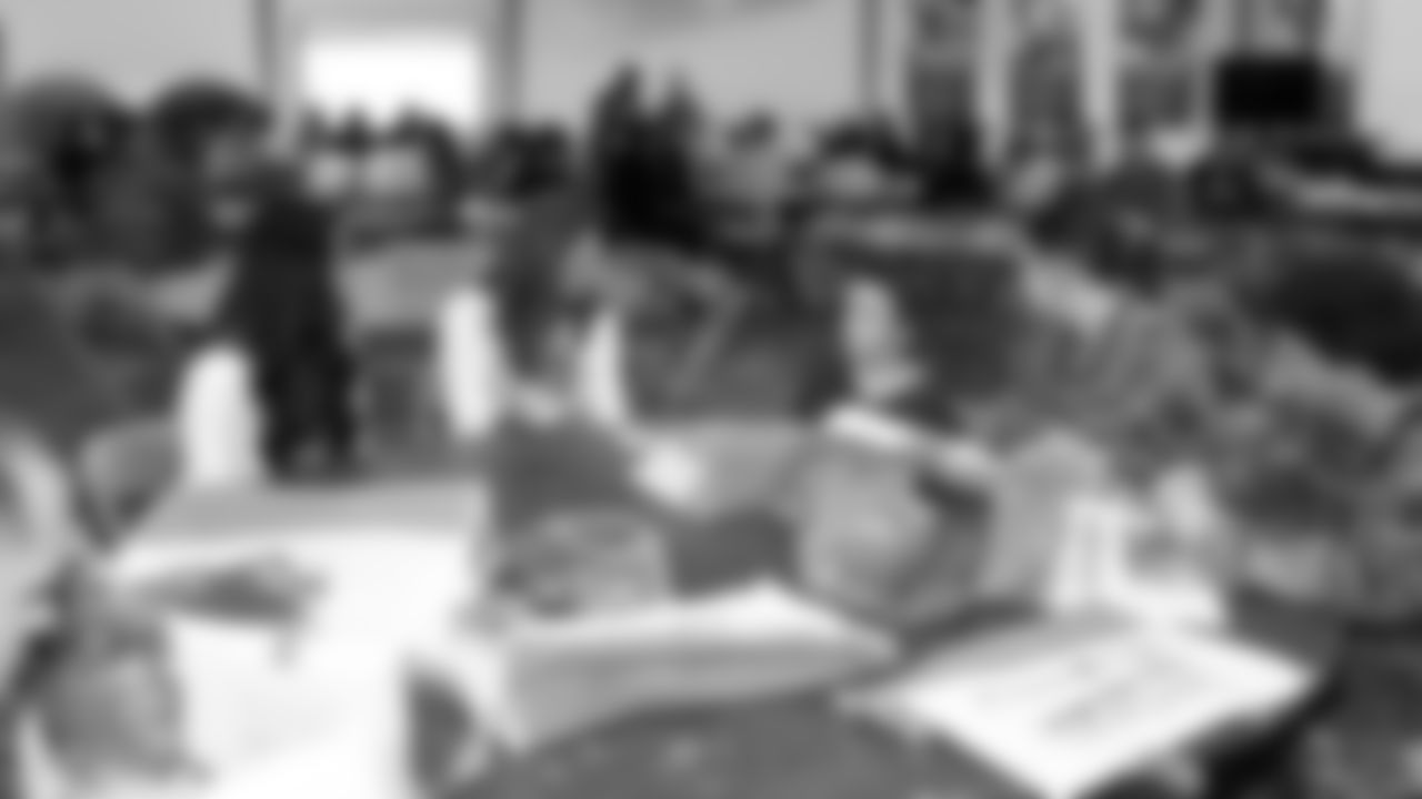 Kansas City Chiefs representatives and the Little Caesars Love Kitchen provide pizza for local U.S. service members and their families at Life.Church Faith & Family Chapel on Tuesday, September 23, 2025 in Kansas City, MO.