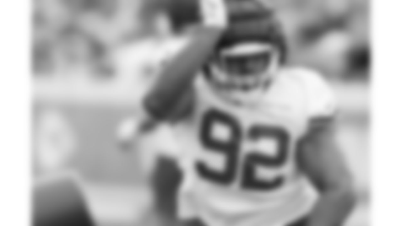 Kansas City Chiefs defensive tackle Marlon Tuipulotu (92) participates in drills during day 11 of training camp practice on Sunday, August 3, 2025.
