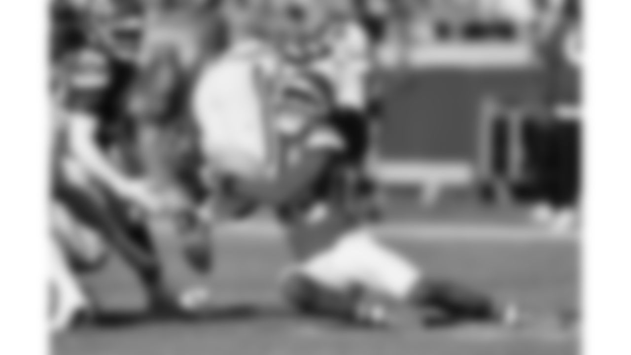 Kansas City Chiefs cornerback Trent McDuffie (22) tackles Indianapolis Colts running back Jonathan Taylor (28) during a week 12 NFL football game, Sunday, November 23, 2025 in Kansas City, MO.