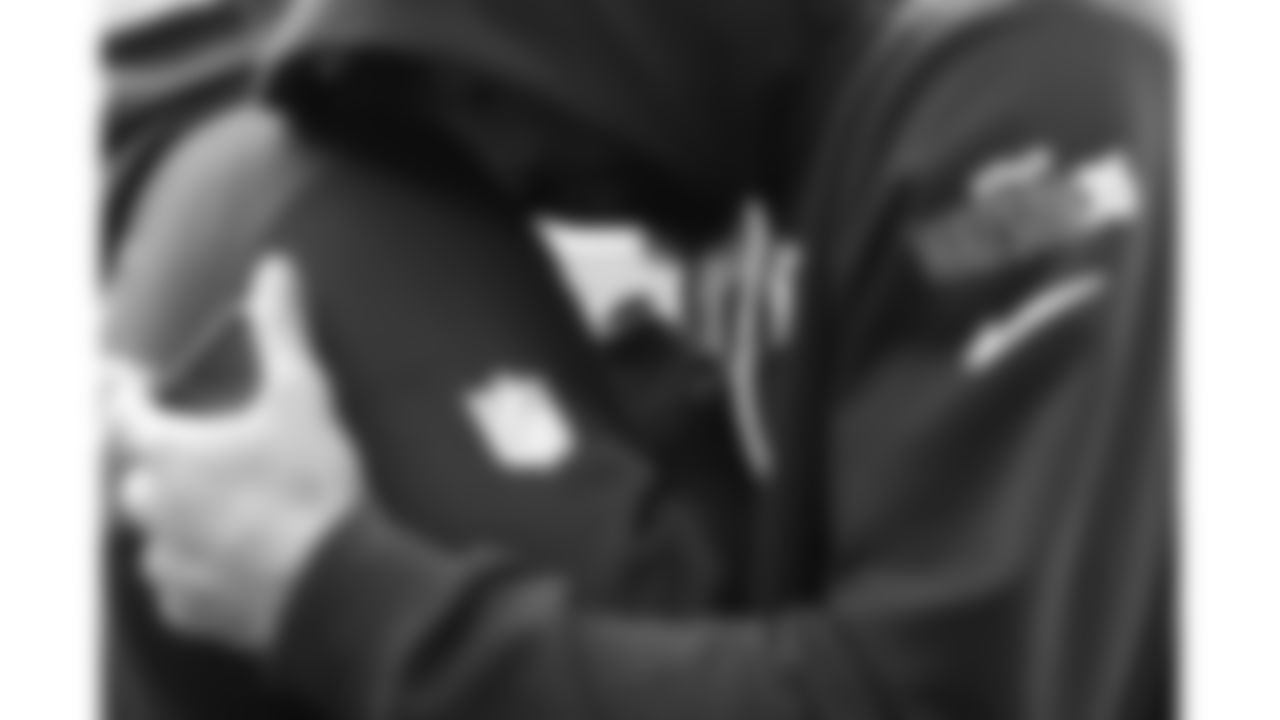 Kansas City Chiefs cornerback Jaylen Watson (35) prays with team chaplain Marcellus Casey prior to a week 16 NFL Football game against the Tennessee Titans on Sunday, December 21, 2025 in Nashville, Tennessee.