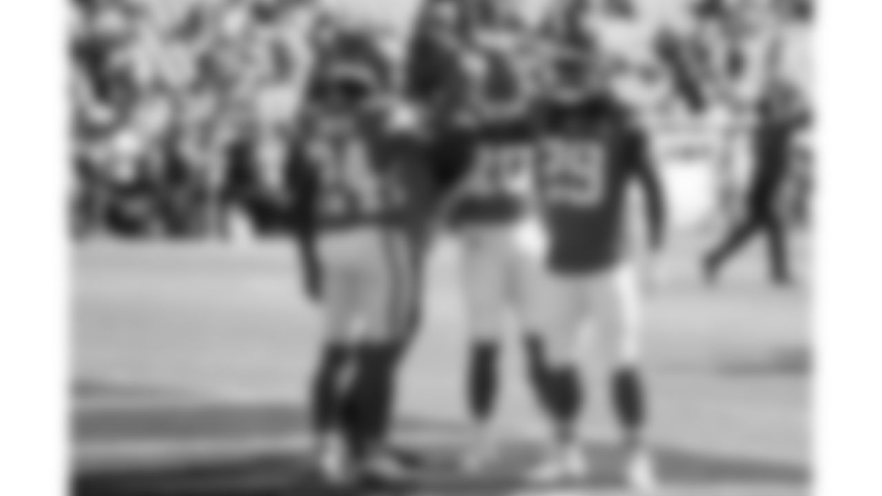 Kansas City Chiefs running backs huddle in the end zone prior to a week 7 NFL football game against the Las Vegas Raiders, Sunday, October 19, 2025 in Kansas City, MO.