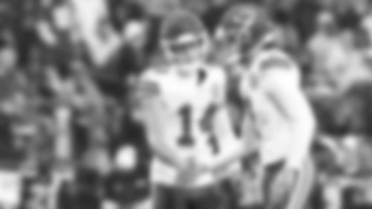 Kansas City Chiefs punter Matt Araiza (14) and kicker Harrison Butker (7) high five during a preseason week 2 NFL football game against the Seattle Seahawks, Friday, August 15, 2025 in Seattle, WA.