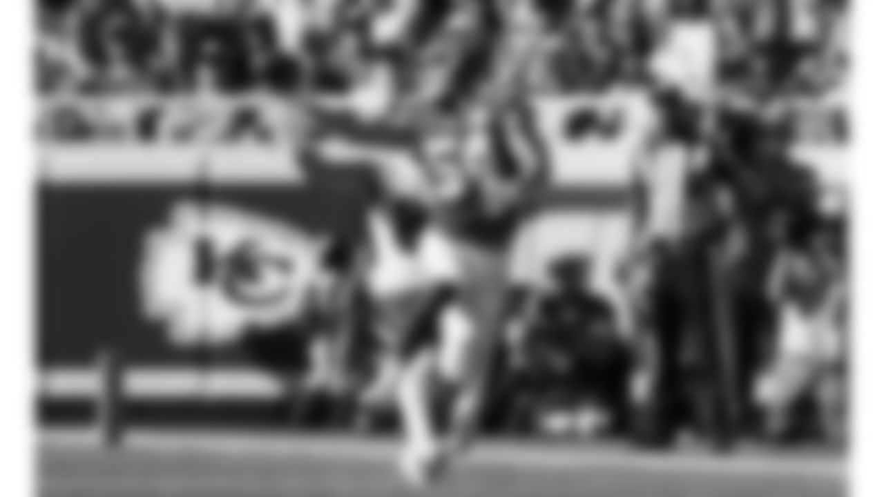 Kansas City Chiefs linebacker Leo Chenal (54) picks off the ball in front of Baltimore Ravens tight end Mark Andrews (89) during the week 4 NFL football game, Sunday, September 28, 2025 in Kansas City, MO.