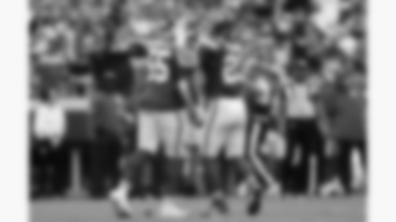 Kansas City Chiefs defensive tackle Omarr Norman-Lott (55) celebrates with middle linebacker Drue Tranquill (23) after a sack during the week 2 NFL football game against the Philadelphia Eagles, Sunday, September 14, 2025 in Kansas City, MO.