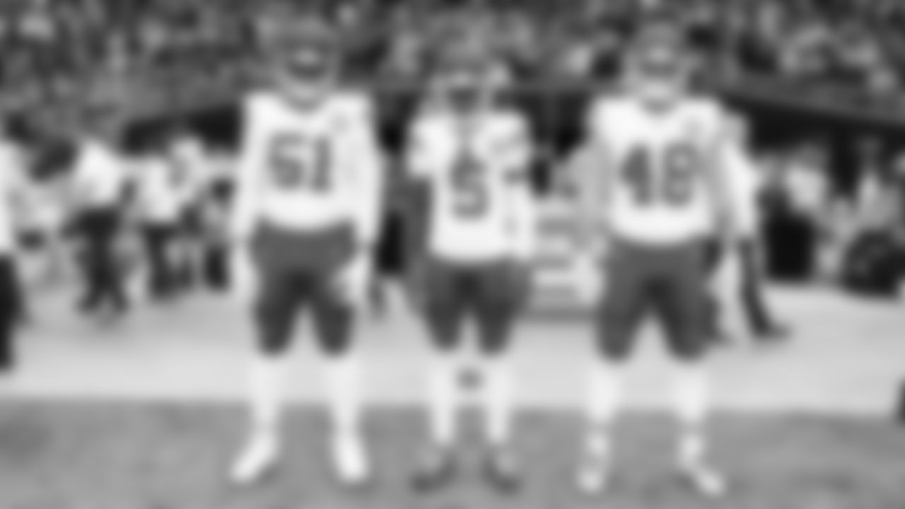 Kansas City Chiefs game captains defensive end Mike Danna (51), wide receiver Hollywood Brown (5) and linebacker Cole Christiansen (48) line up prior to a week 18 NFL football game against the Las Vegas Raiders, Sunday, January 4, 2026 in Las Vegas, NV.