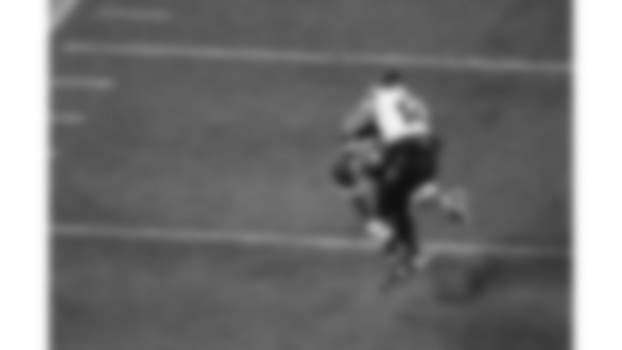 Kansas City Chiefs cornerback Jaylen Watson (35) tackles Houston Texans wide receiver Jaylin Noel (14) during a week 14 NFL football game, Sunday, December 7, 2025 in Kansas City, MO.