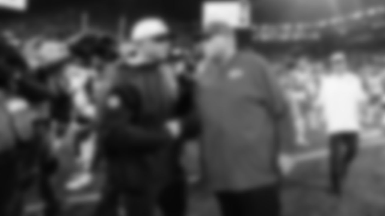 Kansas City Chiefs Head Coach Andy Reid shakes hands with Seattle Seahawks Head Coach Mike Macdonald following a preseason week 2 NFL football game, Friday, August 15, 2025 in Seattle, WA.