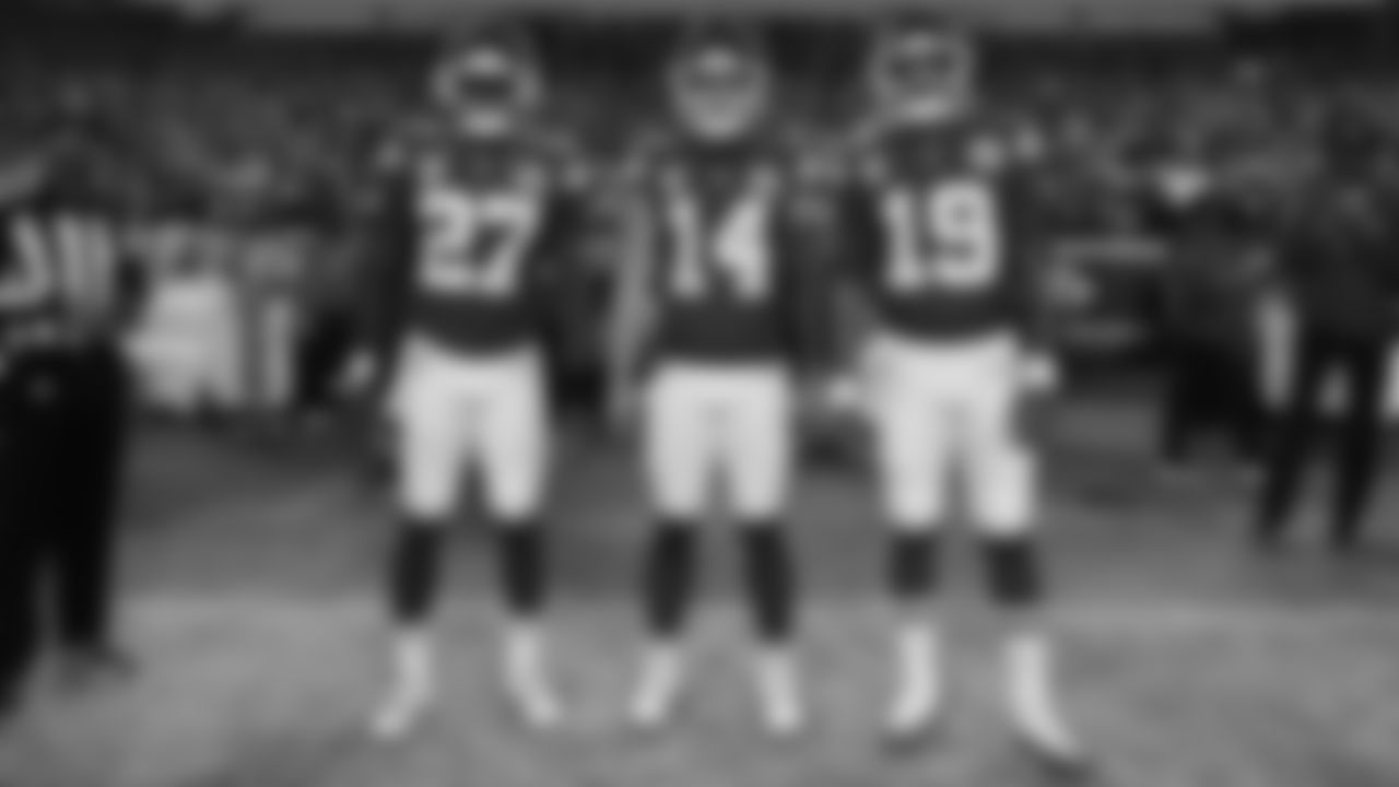 Team Captains - defensive back Chamarri Conner (27), punter Matt Araiza (14) and Kansas City Chiefs quarterback Chris Oladokun (19)  prior to an NFL week 17 matchup against the Denver Broncos, Thursday, December 25, 2025.