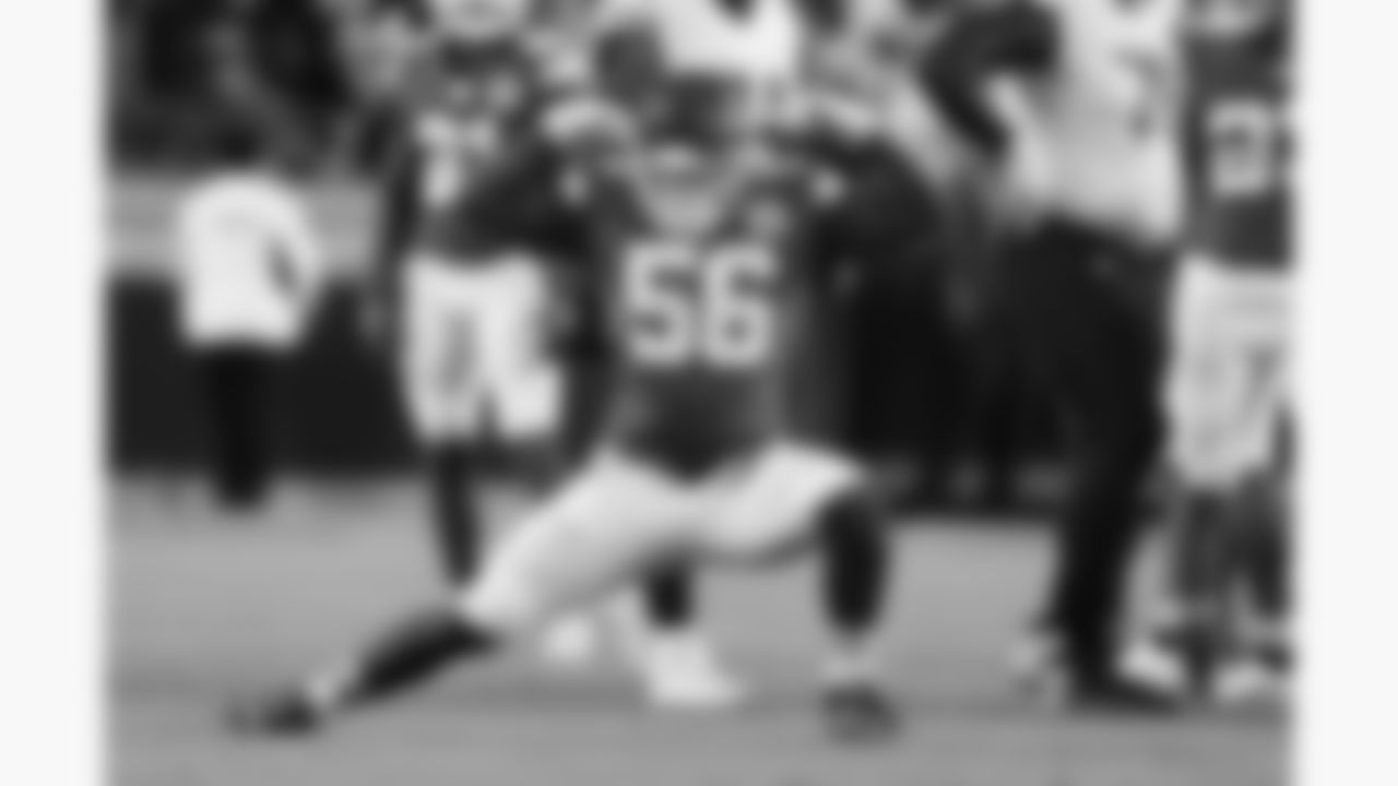 Kansas City Chiefs defensive end George Karlaftis (56) flexes during a week 8 NFL Football game against the Washington Commanders on Monday, October 27, 2025 in Kansas City, MO.