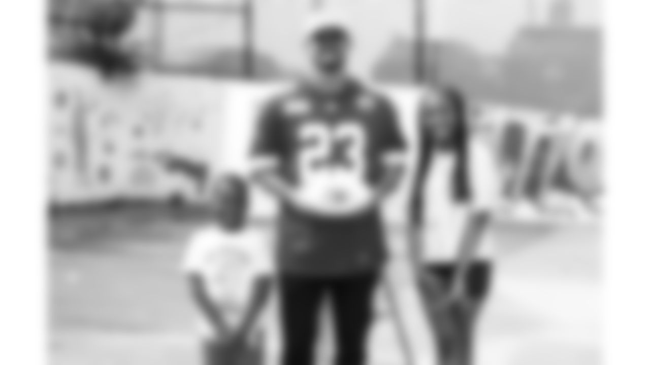 Kansas City Chiefs middle linebacker Drue Tranquill (23) reveals plans of a new play area at Operation Breakthrough on Wednesday, June 4, 2025 in Kansas City, MO.