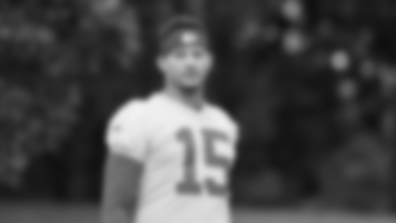 Kansas City Chiefs quarterback Patrick Mahomes (15) walking down the hill to training camp on day 1 of practice, Tuesday July 22, 2025