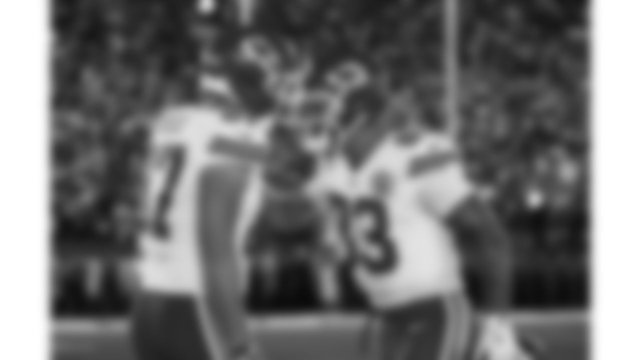 Kansas City Chiefs tight end Travis Kelce (87) and tight end Noah Gray (83) hype each other up prior to the week 3 NFL football game against the New York Giants, Sunday, September 21, 2025 in East Rutherford, NJ.